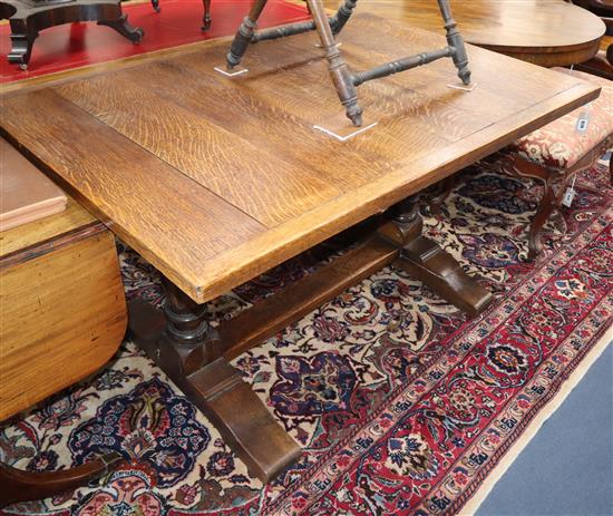 A 1920s oak refectory table L.140cm